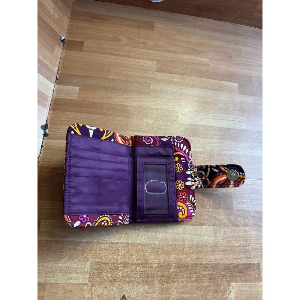 Vera Bradley Turnlock Wallet in the retired Safari Sunset pattern.